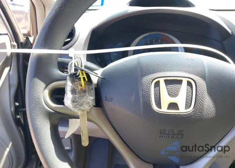 2010 Honda Insight Lx z USA, uszkodzony, nr VIN JHMZE2H58AS014625